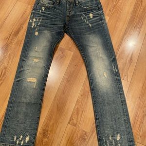 Distressed Denim Jeans